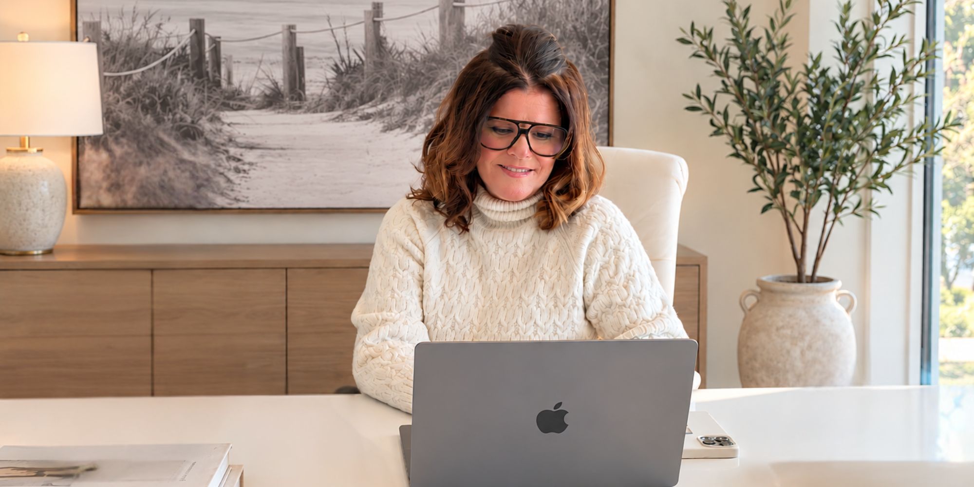 Barbara Scarlett, Fort Erie real estate broker, working at her desk